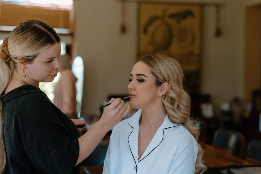 Bride having her makeup done on her wedding day in the Hunter Valley NSW