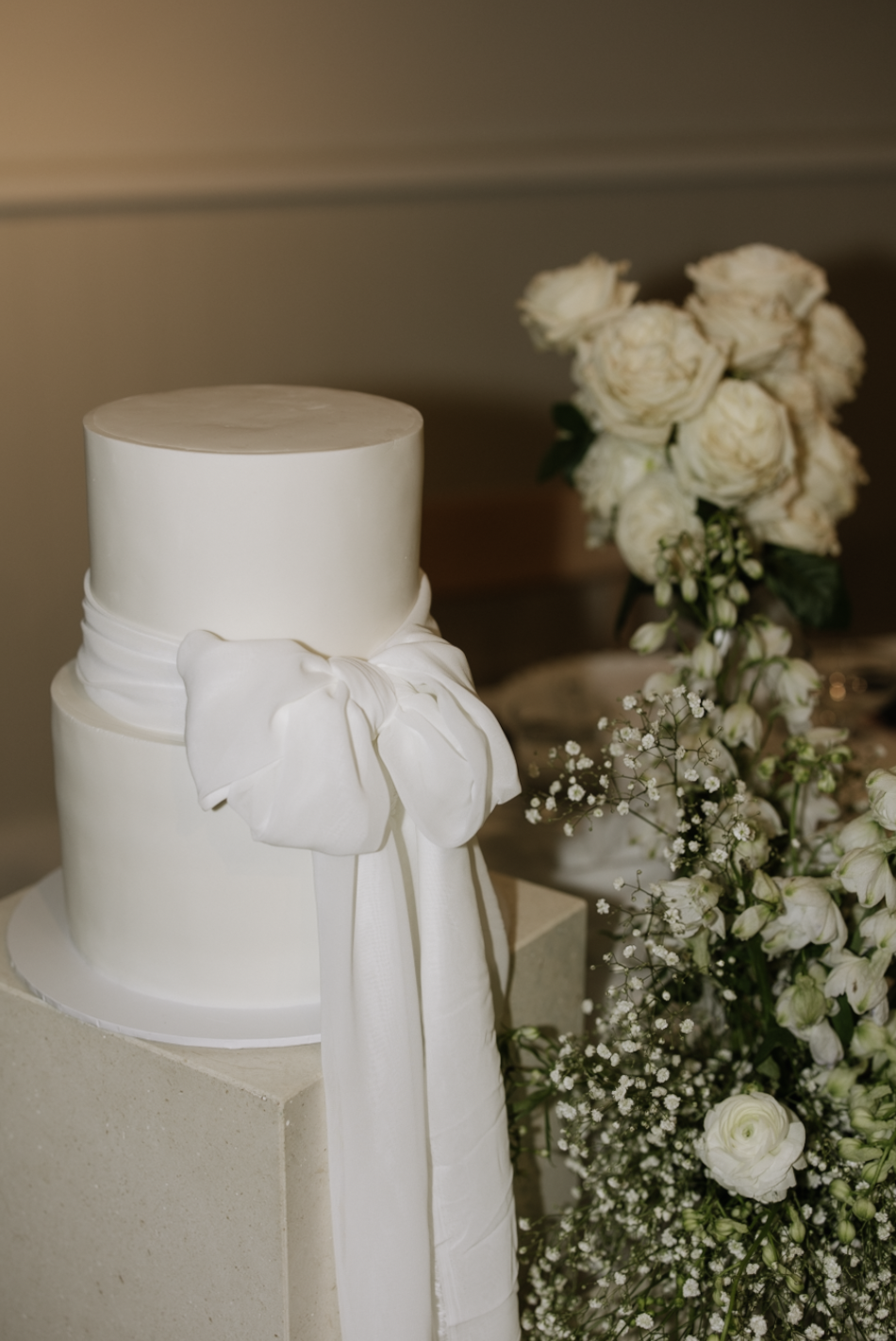 Two tier wedding cake & flowers by adelaide wedding photographer